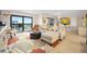 Bright living room with comfy seating and ocean view at 1513 Ocean Shore Blvd # 6C, Ormond Beach, FL 32176