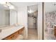 Bathroom boasts vanity, closet, and shower at 1513 Ocean Shore Blvd # 6C, Ormond Beach, FL 32176