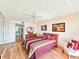 Bedroom with a queen-size bed and mirrored closet at 2600 Ocean Shore Blvd # 3060, Ormond Beach, FL 32176