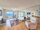 Relaxing living room featuring ocean view and comfortable seating at 2600 Ocean Shore Blvd # 3060, Ormond Beach, FL 32176