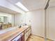 Bathroom with a single vanity, wood cabinets and a shower/tub combo at 2600 Ocean Shore Blvd # 3060, Ormond Beach, FL 32176