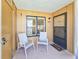 Welcoming entryway with two chairs and a doormat at 2600 Ocean Shore Blvd # 3060, Ormond Beach, FL 32176