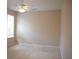 Well-lit bedroom featuring a ceiling fan and large window at 10224 Hart Branch Cir, Orlando, FL 32832