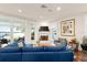 Comfortable living room with fireplace and water views at 70 Riverside Dr, Ormond Beach, FL 32176