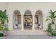 Stunning entryway with arched doorways and ornate columns at 70 Riverside Dr, Ormond Beach, FL 32176