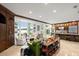 Open concept living room with kitchen and water views at 70 Riverside Dr, Ormond Beach, FL 32176