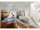 Game room features ping pong table, weights, and office area at 70 Riverside Dr, Ormond Beach, FL 32176
