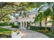Grand home with elegant entryway and lush landscaping at 70 Riverside Dr, Ormond Beach, FL 32176