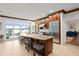 Gourmet kitchen with island, stainless steel appliances, and water views at 70 Riverside Dr, Ormond Beach, FL 32176