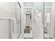Clean bathroom with a shower, tile flooring, and white walls at 70 Riverside Dr, Ormond Beach, FL 32176