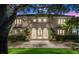 Stunning two-story home featuring a grand entrance and manicured landscaping at 70 Riverside Dr, Ormond Beach, FL 32176