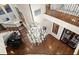 Elegant entryway with a grand chandelier and hardwood floors at 70 Riverside Dr, Ormond Beach, FL 32176