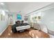 Spacious bedroom with hardwood floors and built-in shelving at 70 Riverside Dr, Ormond Beach, FL 32176