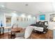 Light and airy bedroom with hardwood floors and sitting area at 70 Riverside Dr, Ormond Beach, FL 32176