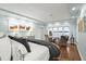 Main bedroom with water views and a sitting area at 70 Riverside Dr, Ormond Beach, FL 32176