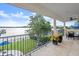 Spacious balcony with water views and comfortable seating at 70 Riverside Dr, Ormond Beach, FL 32176