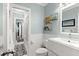 Modern bathroom with white vanity, walk-in shower, and elegant fixtures at 70 Riverside Dr, Ormond Beach, FL 32176