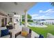 Relaxing pool area with patio furniture and waterfront view at 70 Riverside Dr, Ormond Beach, FL 32176