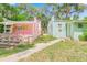 Two houses needing renovation, side-by-side at 321 Cedar St, Daytona Beach, FL 32114