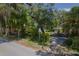 Aerial view showcasing a home nestled among lush trees and a residential neighborhood at 321 Cedar St, Daytona Beach, FL 32114