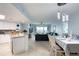 Open concept living space showcasing the kitchen, dining area, and living room at 2937 S Atlantic Ave # 1504, Daytona Beach, FL 32118