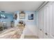 Kitchen island with granite countertop and adjacent cabinets at 2937 S Atlantic Ave # 1504, Daytona Beach, FL 32118