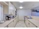 Community kitchen with appliances and counters at 2937 S Atlantic Ave # 1504, Daytona Beach, FL 32118