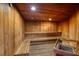 Community sauna with wooden benches and walls at 2937 S Atlantic Ave # 1504, Daytona Beach, FL 32118