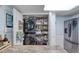 Stackable washer and dryer in a well-organized laundry closet at 2937 S Atlantic Ave # 1504, Daytona Beach, FL 32118