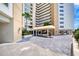 Building entrance with covered walkway and landscaping at 2937 S Atlantic Ave # 1504, Daytona Beach, FL 32118