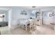 Elegant dining area with a charming table setting and built-in bar at 2937 S Atlantic Ave # 1504, Daytona Beach, FL 32118