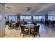 Community lounge with tables and chairs at 2937 S Atlantic Ave # 1504, Daytona Beach, FL 32118