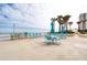 Relaxing ocean view patio with tables and chairs at 2937 S Atlantic Ave # 1504, Daytona Beach, FL 32118