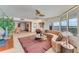 Open living space featuring a curved sofa, and city views at 2545 S Atlantic Ave # 1701, Daytona Beach Shores, FL 32118