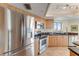 Modern kitchen with stainless steel appliances and granite countertops at 2545 S Atlantic Ave # 1701, Daytona Beach Shores, FL 32118
