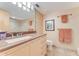 Bathroom with granite countertop, double sinks, and modern fixtures at 2545 S Atlantic Ave # 1701, Daytona Beach Shores, FL 32118