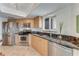 Modern kitchen with stainless steel appliances and granite countertops at 2545 S Atlantic Ave # 1701, Daytona Beach Shores, FL 32118