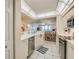 Modern kitchen with stainless steel appliances and ocean view at 4525 S Atlantic Ave # 1502, Port Orange, FL 32127