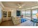Beachy living room with window seat and ocean view at 4525 S Atlantic Ave # 1502, Port Orange, FL 32127