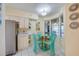 Eat-in kitchen with teal accents and ocean view at 4525 S Atlantic Ave # 1502, Port Orange, FL 32127