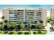 Oceanfront condo building with balconies and lush landscaping at 4525 S Atlantic Ave # 1502, Port Orange, FL 32127