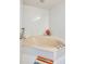 Large corner bathtub with white tile surround at 4525 S Atlantic Ave # 1502, Port Orange, FL 32127