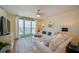 Living Room with ocean views, white couch and hardwood floors at 4525 S Atlantic Ave # 1502, Port Orange, FL 32127