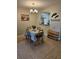 Bright dining area with table and chairs, near kitchen at 1510 Ocean Shore Blvd # 4140, Ormond Beach, FL 32176