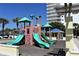 Playground with slides and climbing structures at 1510 Ocean Shore Blvd # 4140, Ormond Beach, FL 32176