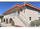 Two-story building with terracotta roof and balconies at 1510 Ocean Shore Blvd # 4140, Ormond Beach, FL 32176