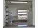 Small kitchen with white cabinets and view at 1510 Ocean Shore Blvd # 4140, Ormond Beach, FL 32176