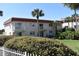Two-story building with red roof and balconies at 1510 Ocean Shore Blvd # 4140, Ormond Beach, FL 32176