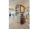 View of kitchen with white cabinets and granite countertops at 4555 S Atlantic Ave # 4304, Ponce Inlet, FL 32127