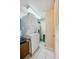 Laundry room with stacked washer and dryer at 4555 S Atlantic Ave # 4304, Ponce Inlet, FL 32127